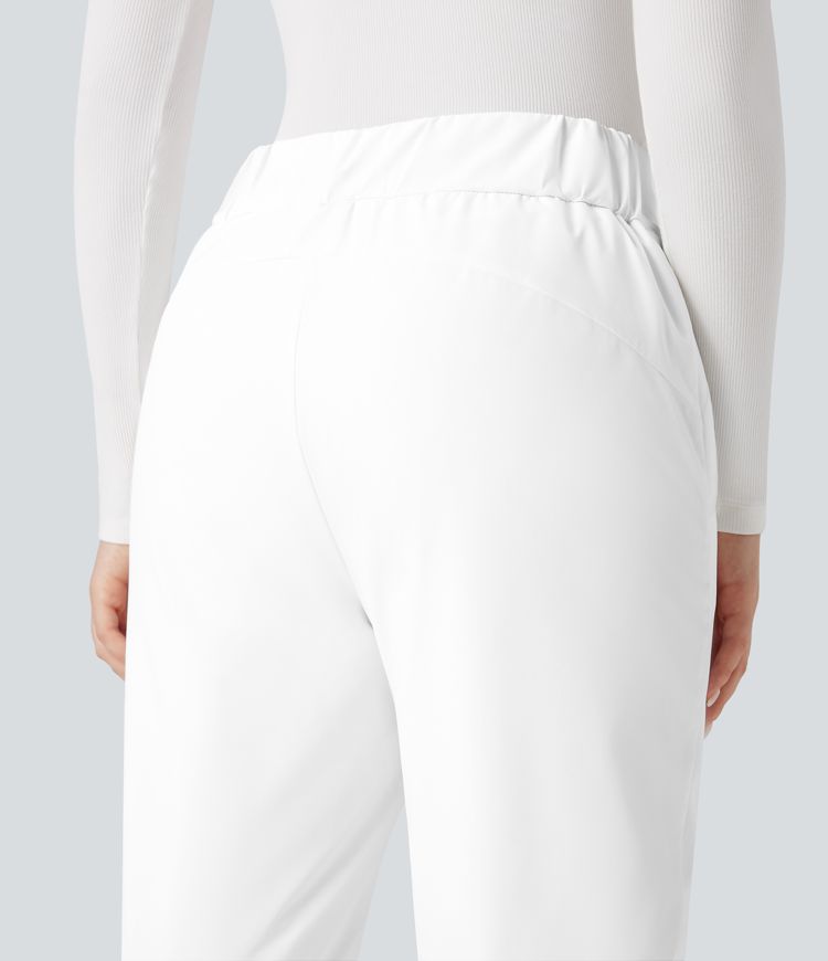 warme wandelbroek met hoge taille en bootcut model met zakken.