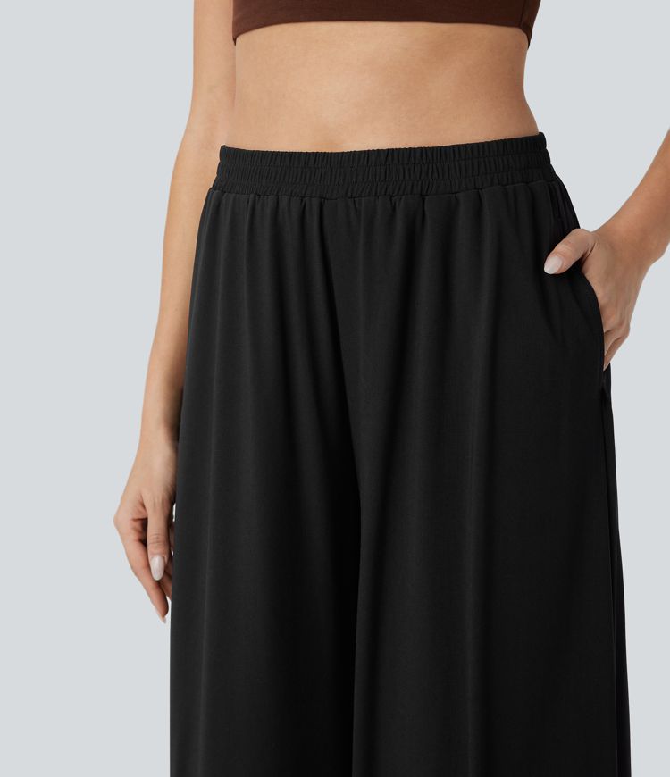 casual broek met hoge taille zakken mesh overlay en wijde pijpen