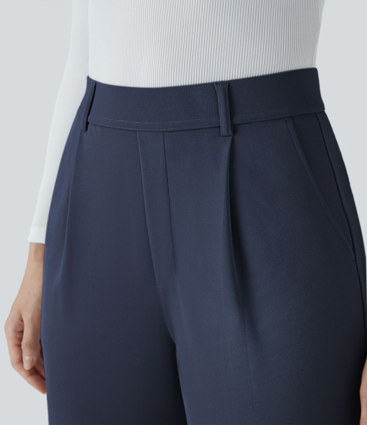 halara flex werkbroek met hoge taille zakken en rechte pijpen gemaakt van crêpe.