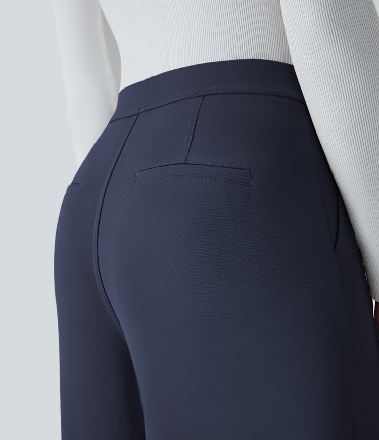 halara flex werkbroek met hoge taille zakken en rechte pijpen gemaakt van crêpe.