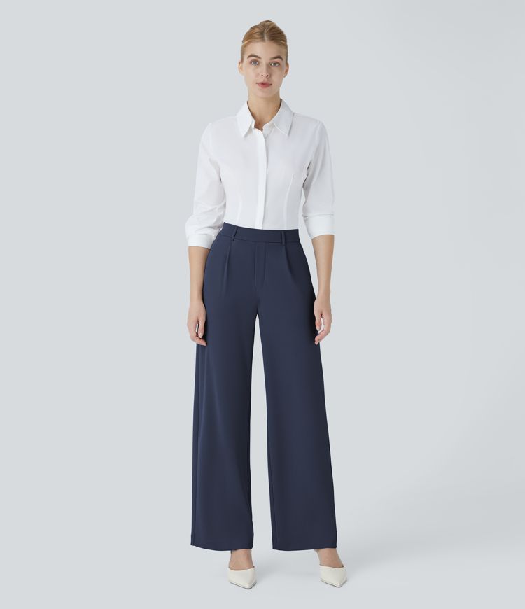 halara flex werkbroek met hoge taille zakken en rechte pijpen gemaakt van crêpe.