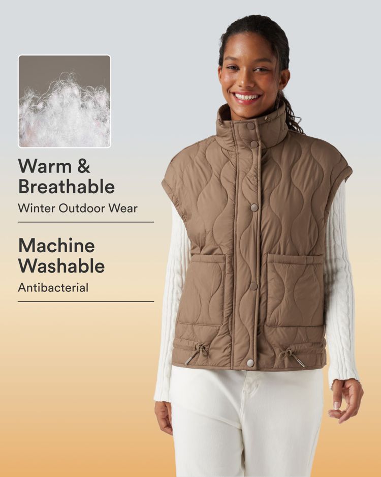 duurzaam waterafstotend casual gewatteerd vest met hoge hals en trekkoord in de zoom gemaakt van synthetisch dons met zakken.