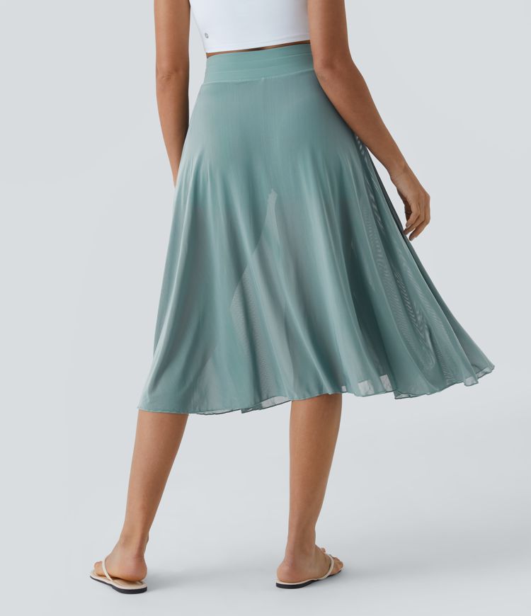 midi-rok met hoge taille trekkoord contrasterend mesh en 2-in-1 zakken zwierig model en wijdvallend model.