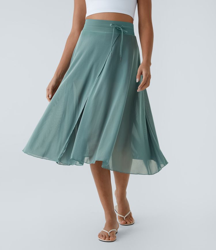 midi-rok met hoge taille trekkoord contrasterend mesh en 2-in-1 zakken zwierig model en wijdvallend model.