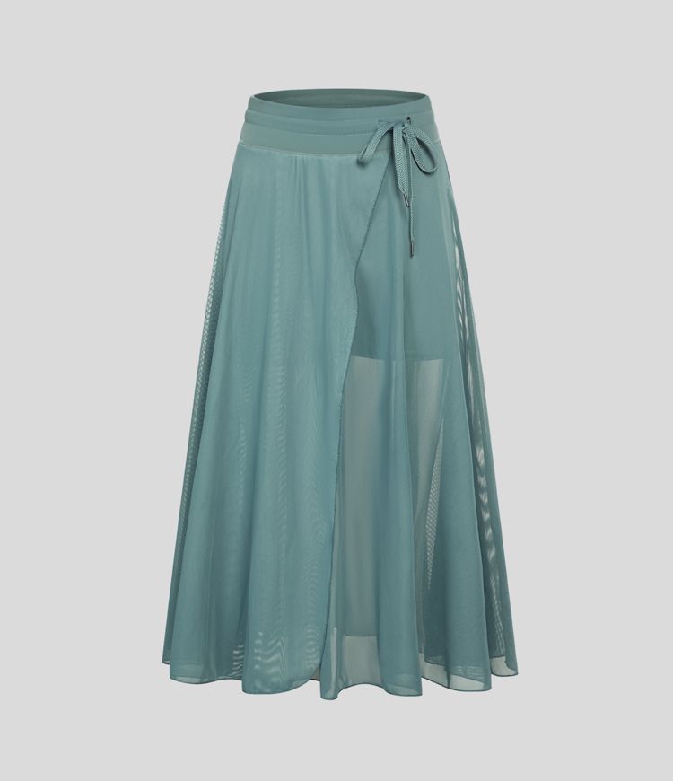 midi-rok met hoge taille trekkoord contrasterend mesh en 2-in-1 zakken zwierig model en wijdvallend model.