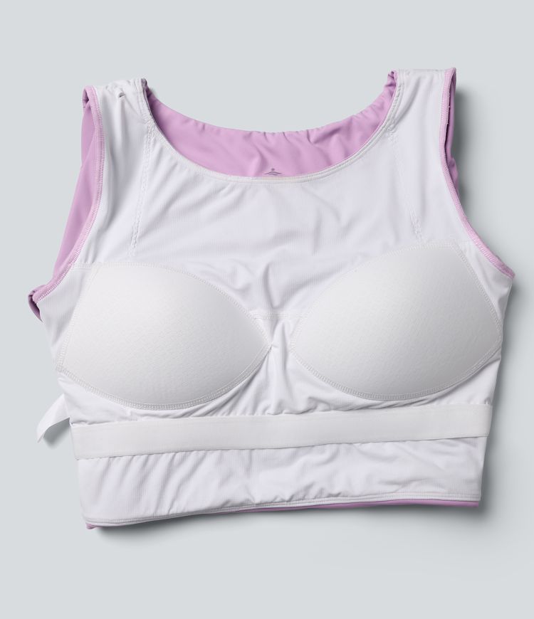 push-up voorgevormde spacer top met ronde hals lange mouwen en duimgaten cropped model geschikt voor yoga of andere sporten.