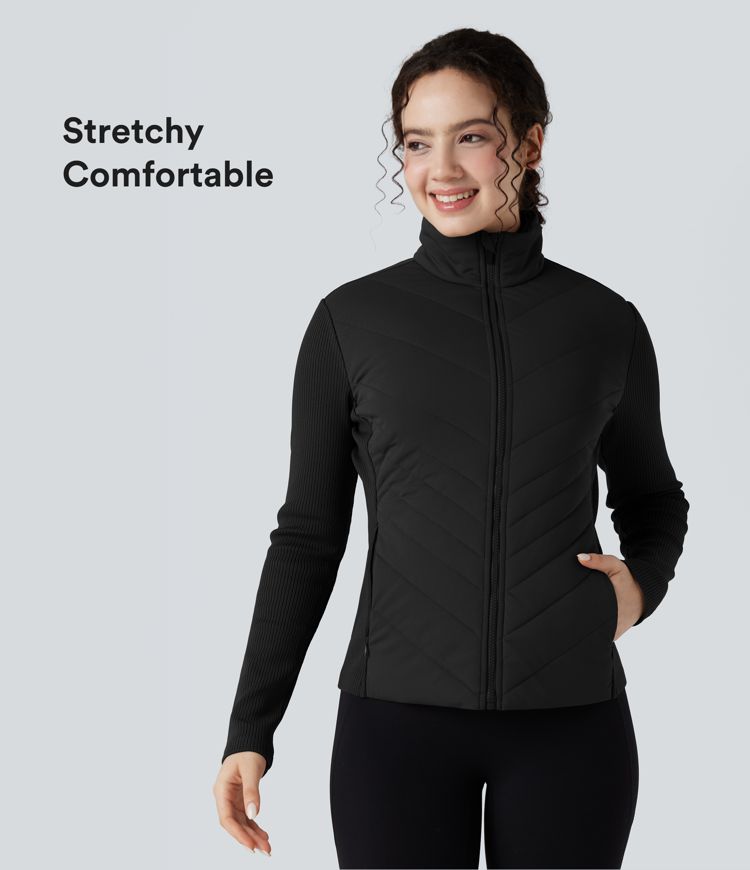 gewatteerde jas met hoge kraag contrasterende ribbels slanke pasvorm en zakken.