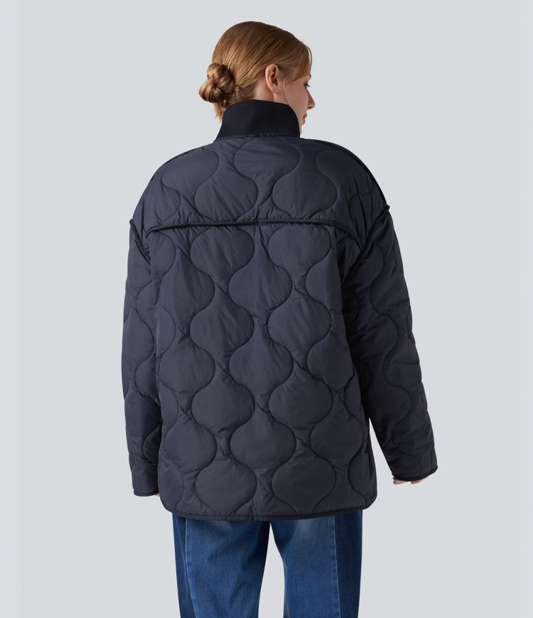 casual gewatteerde jas met hoge hals ritssluiting lange mouwen en zakken.