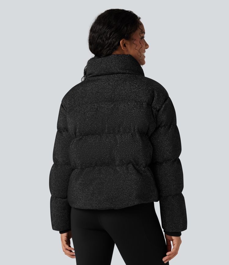 casual pufferjack met hoge hals trekkoord in de zoom en glitterdetails en zakken.