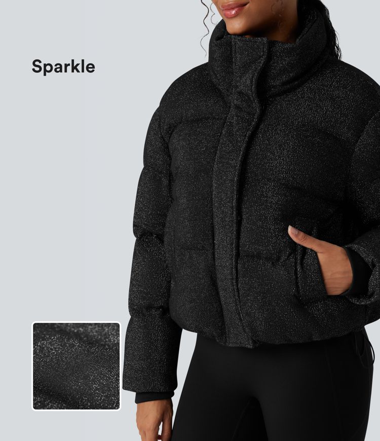 casual pufferjack met hoge hals trekkoord in de zoom en glitterdetails en zakken.